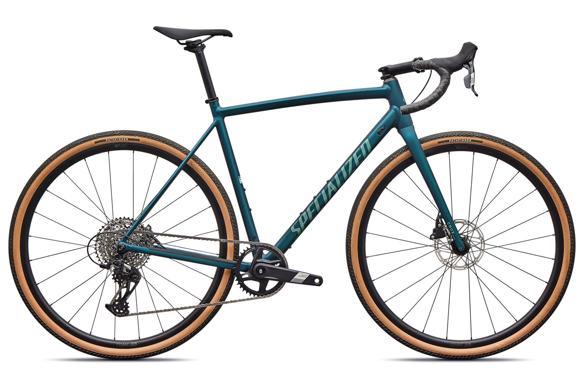 Bicicleta de gravel Specialized Crux DSW 2026 con SRAM Apex XPLR, cuadro de aleación E5 Premium, ruedas DT Swiss G540 y neumáticos Pathfinder Pro. Ligera, resistente y versátil.